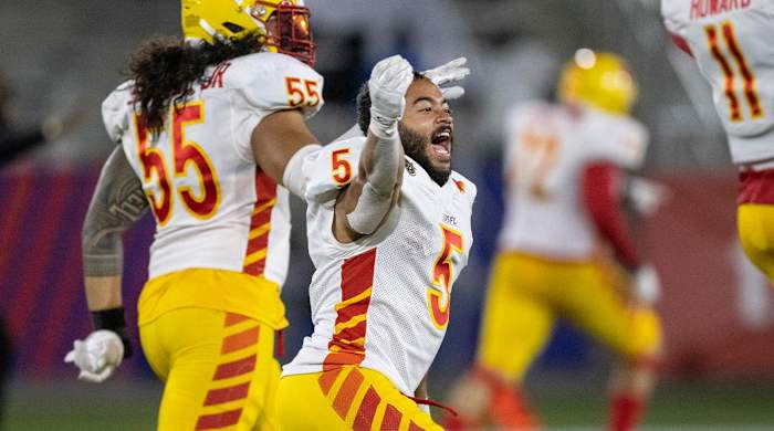 May 6, 2022; Birmingham, AL, USA; Philadelphia Stars running back Matt Colburn II (5) celebrates a win after a missed field goal at the buzzer by Michigan Panthers punter Michael Carrizosa (17) at Protective Stadium.